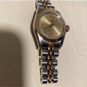 Oyster perpetual Rolex gold dial silver and gold bracelet 26 mm
